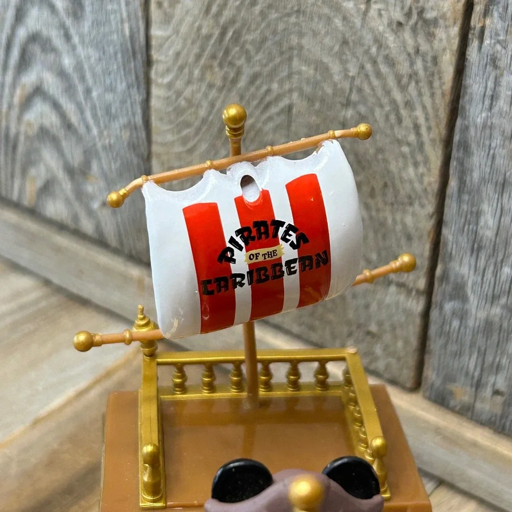 Disney Parks Pirates of the Caribbean Mickey Mouse Pirate Ship Toy Rolling Brown